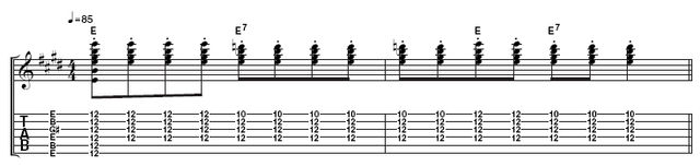 Example 1: Sonny transforms the basic open E chord, played at the 12th fret with the slide to a dominant seventh, by fretting behind the slide on the 10th fret with his first finger